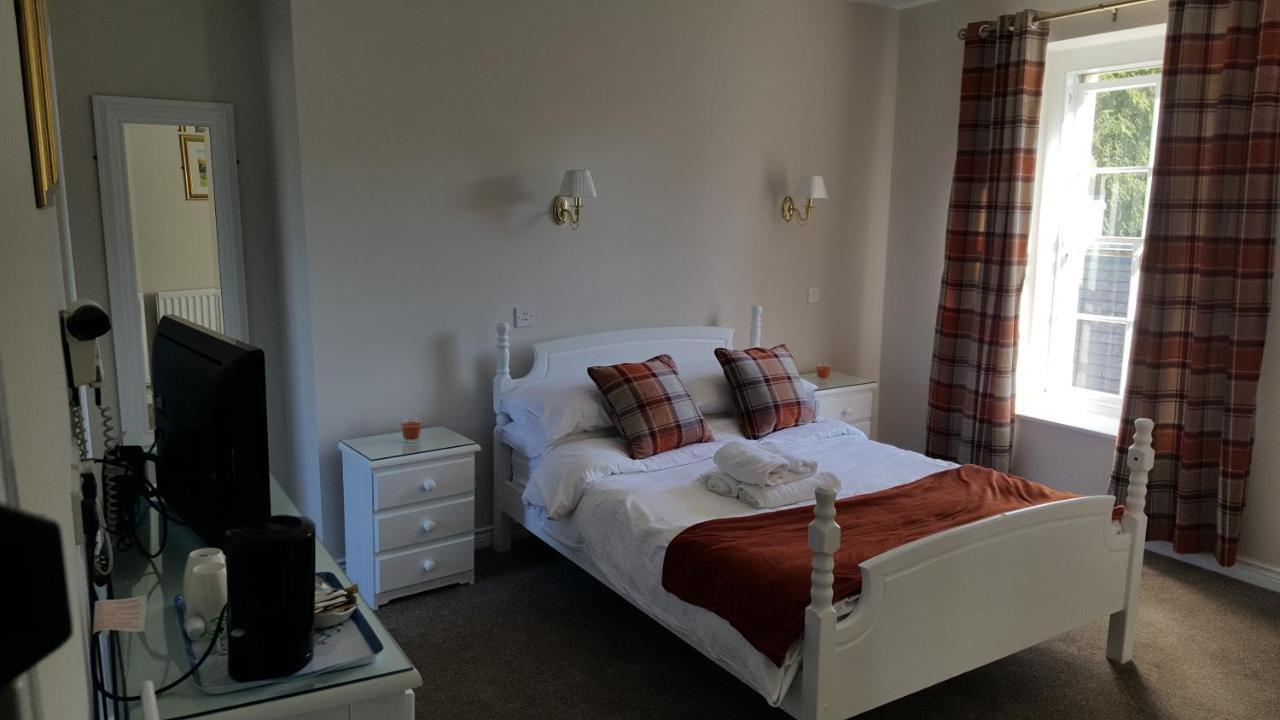 Central Bar Guesthouse Cushendall Buitenkant foto